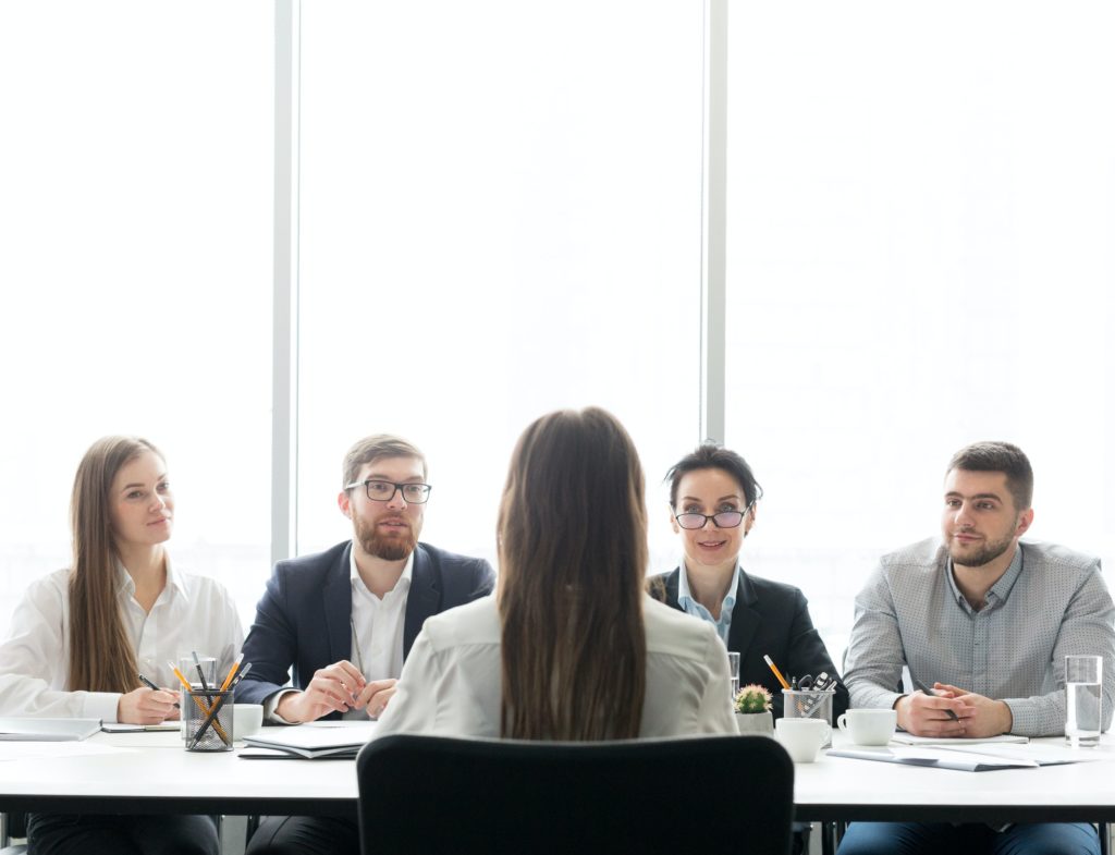 HR managers having job interview with female candidate