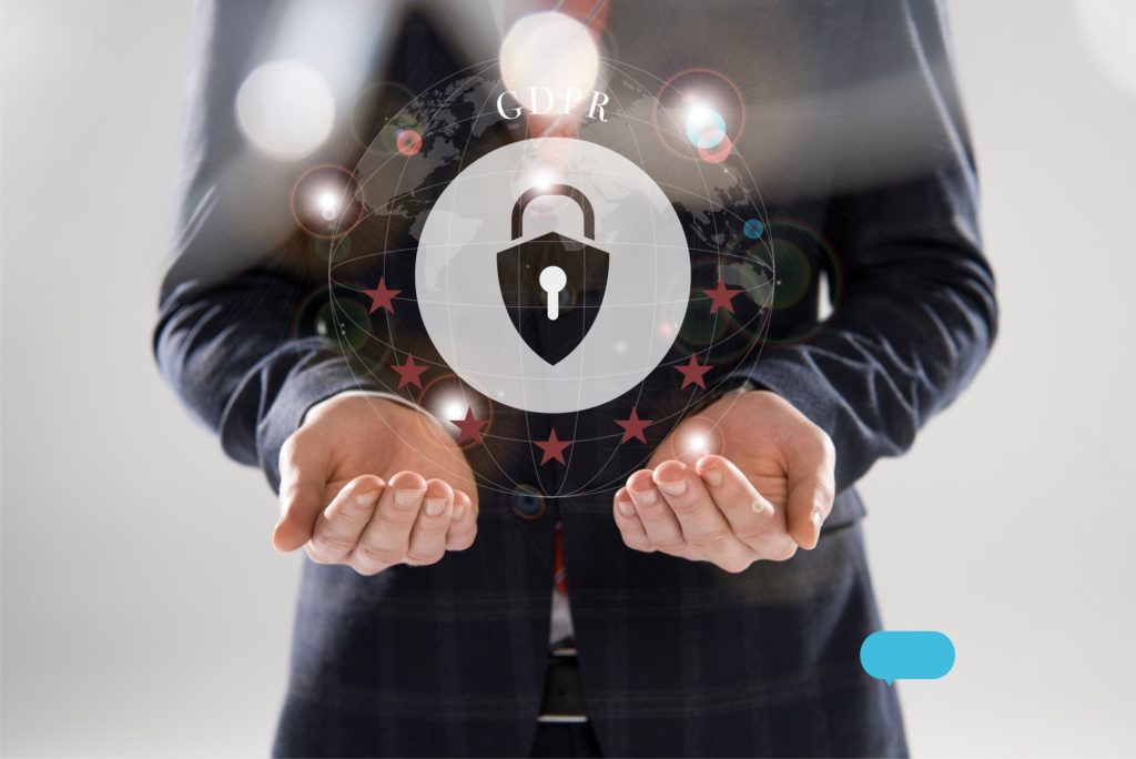 cropped view of businessman in suit with outstretched hands and gdpr letters and lock illustration